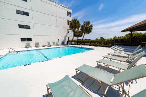 Surf Suites Oceanfront Hotel poolside - The Surf Suites | Wrightsville Beach, NC - The Surf Suites | Wrightsville Beach, NC Pool at the Surf Suites Oceanfront Hotel