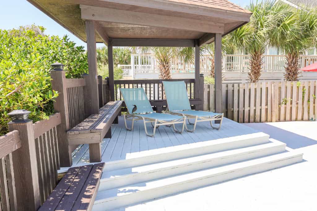 Cabana and lounge chairs on pool deck