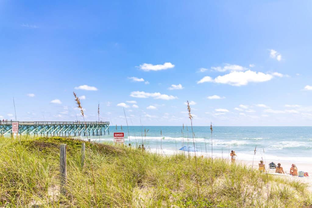 Surf Suites views beach dunes and pier