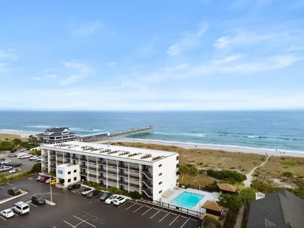 Drone view of Surf Suites and parking lot